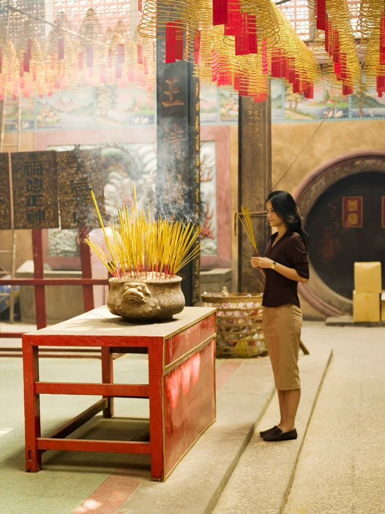 Vietnamese Women Doing Prayer