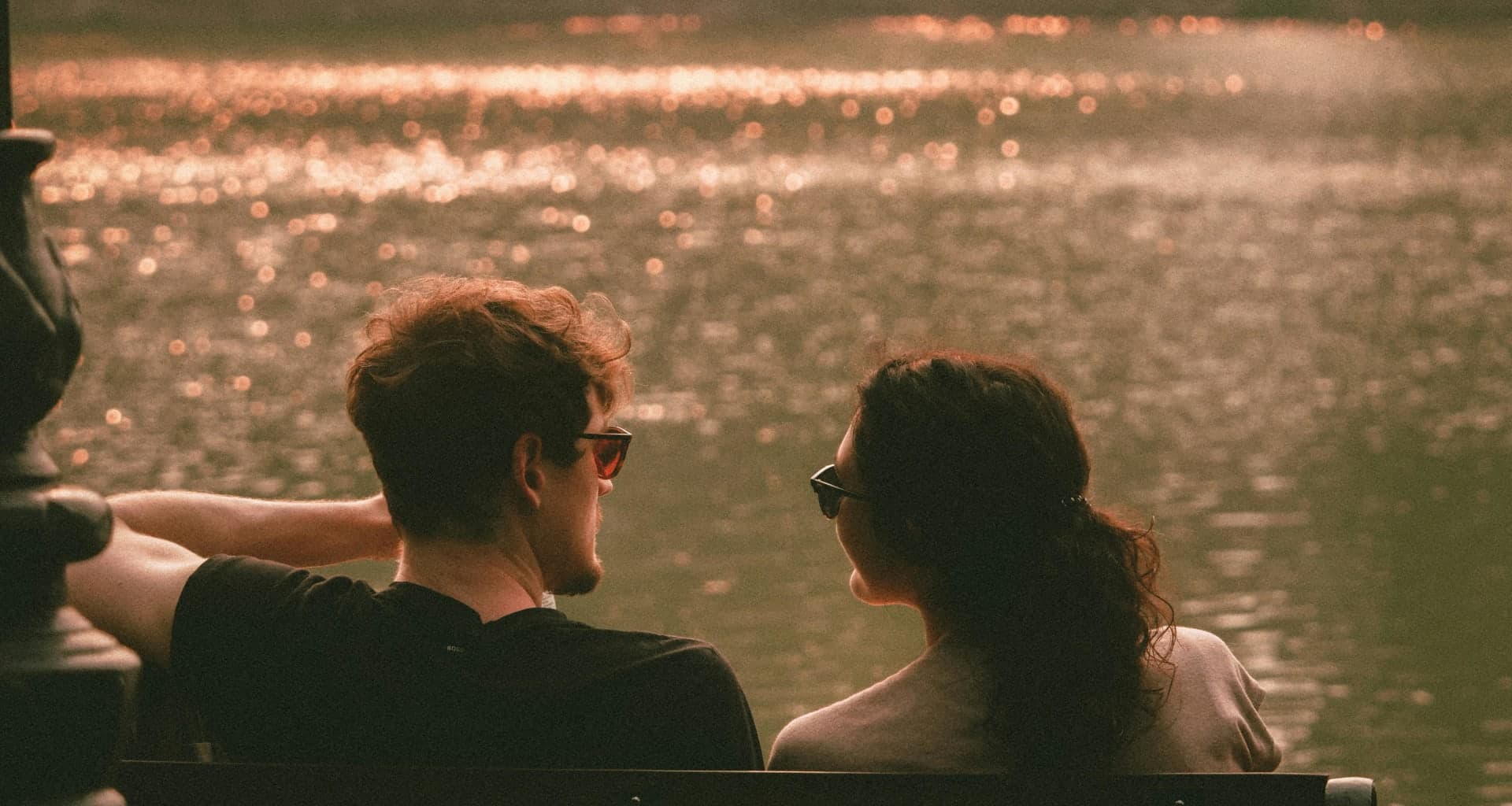 A couple enjoying a romantic sunset on the beach in Vietnam